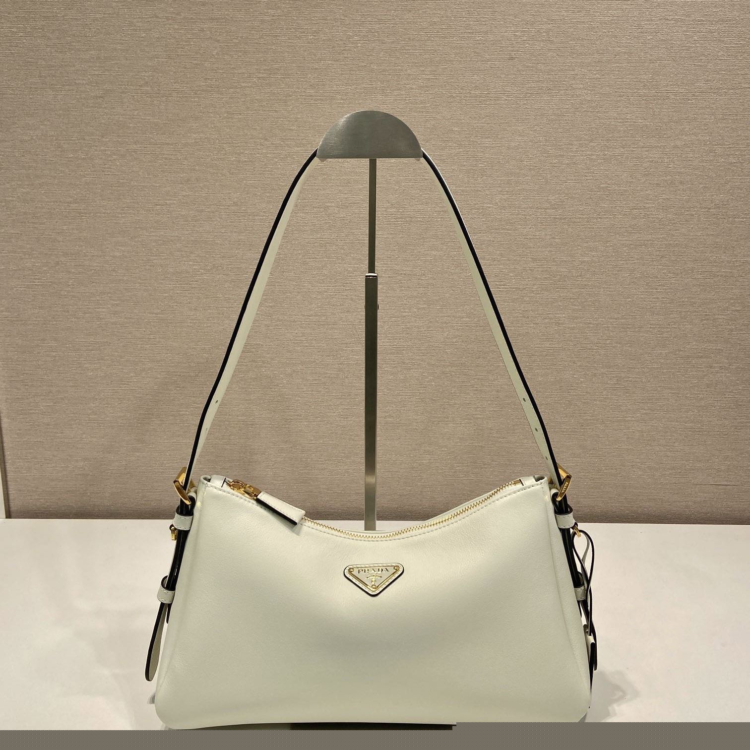 Pra*a top handle bags